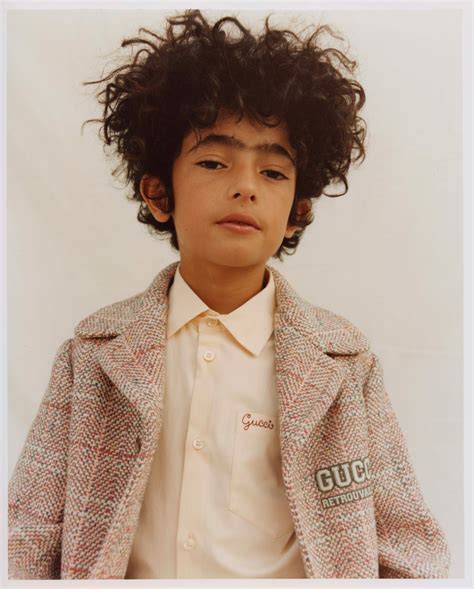 The Rao family interprets the new Gucci Bambino .